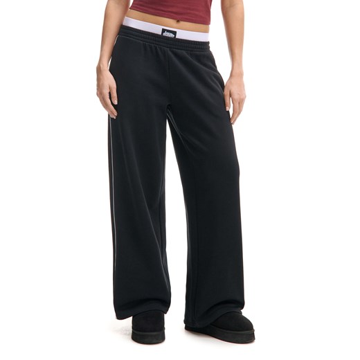 Cropp - Spodnie dresowe typu baggy z lampasami - czarny ze sklepu Cropp w kategorii Spodnie damskie - zdjęcie 177588870