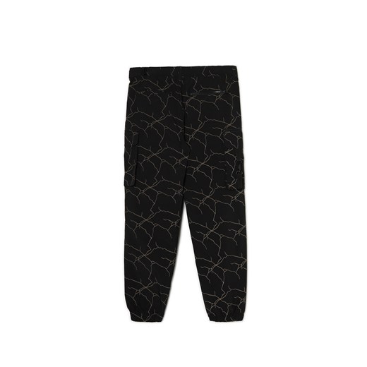 Cropp - Spodnie jogger loose z nadrukiem reflective - czarny Cropp 36 Cropp