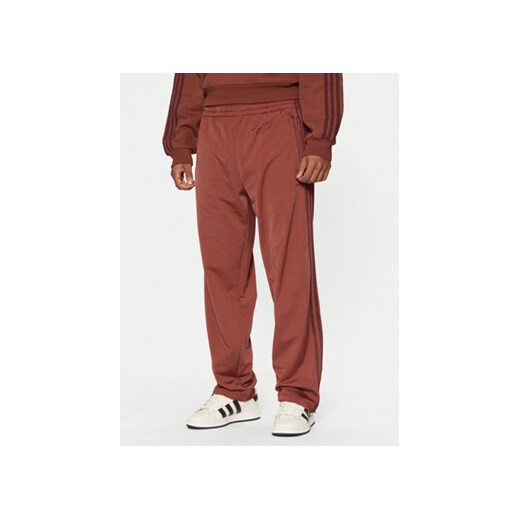 adidas Spodnie dresowe adicolor Classics Firebird JP2541 Czerwony Regular Fit ze sklepu MODIVO w kategorii Spodnie męskie - zdjęcie 177613223