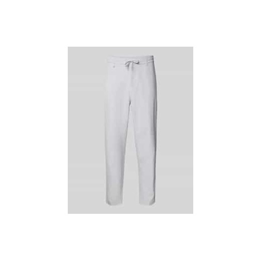 Spodnie materiałowe o kroju regular fit z tunelem model ‘Convert’ ze sklepu Peek&Cloppenburg  w kategorii Spodnie męskie - zdjęcie 177811403