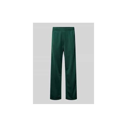 Spodnie dresowe o kroju baggy fit z wpuszczanymi kieszeniami model ‘ADIBREAK’ ze sklepu Peek&Cloppenburg  w kategorii Spodnie męskie - zdjęcie 177820132