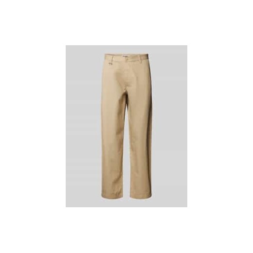 Chinosy o kroju baggy fit z wpuszczanymi kieszeniami ze sklepu Peek&Cloppenburg  w kategorii Spodnie męskie - zdjęcie 177849083
