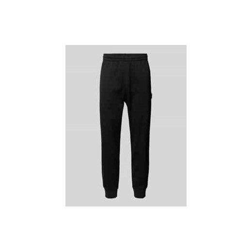 Spodnie dresowe Essentials ze sklepu Peek&Cloppenburg  w kategorii Spodnie męskie - zdjęcie 177850670