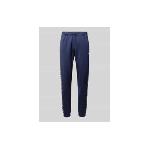 Spodnie dresowe o kroju regular fit z bawełną ze sklepu Peek&Cloppenburg  w kategorii Spodnie męskie - zdjęcie 177852963