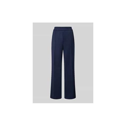Spodnie typu track pants o luźnym kroju z paskami w kontrastowym kolorze model ‘WARM UP X’ ze sklepu Peek&Cloppenburg  w kategorii Spodnie damskie - zdjęcie 177858202