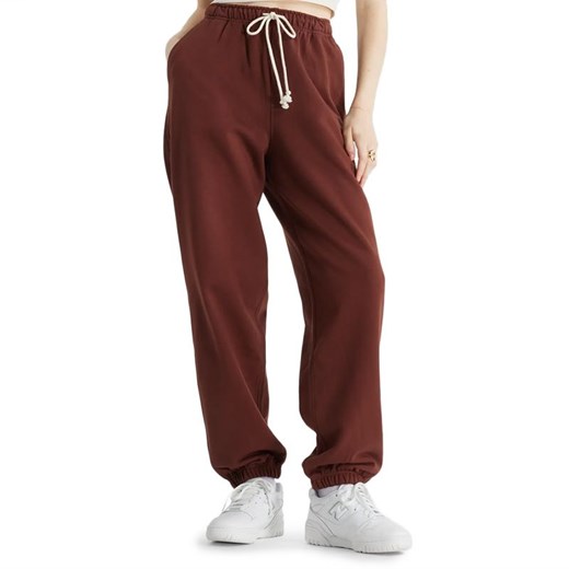 Spodnie New Balance WP41513ROK - brązowe ze sklepu streetstyle24.pl w kategorii Spodnie damskie - zdjęcie 177862403