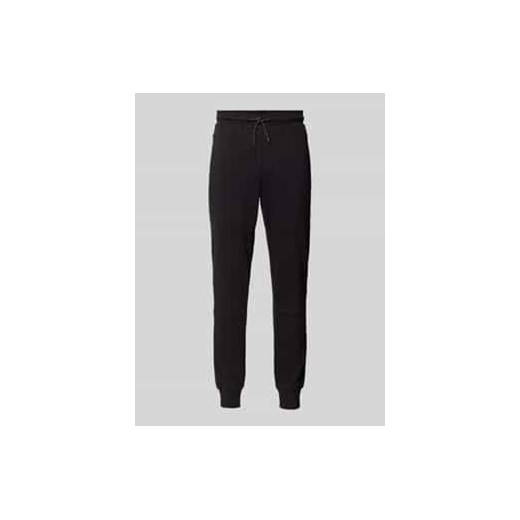 Spodnie dresowe o kroju slim fit z kieszeniami zapinanymi na zamek błyskawiczny model ‘WILL’ ze sklepu Peek&Cloppenburg  w kategorii Spodnie męskie - zdjęcie 178104383
