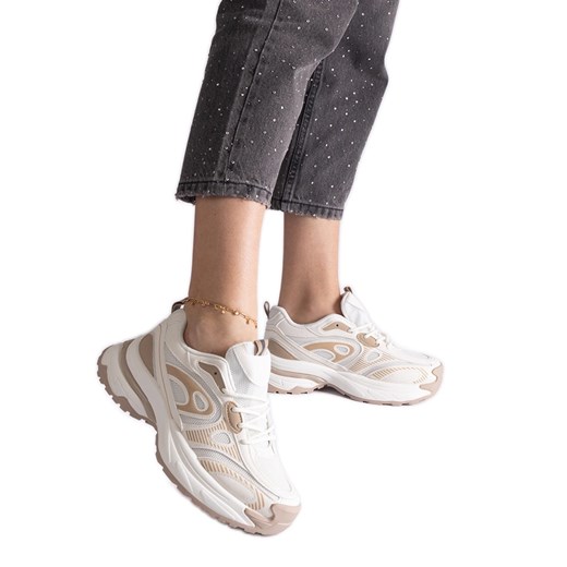 Białe damskie sneakersy sportowe ze sklepu ButyModne.pl w kategorii Buty sportowe damskie - zdjęcie 178153174