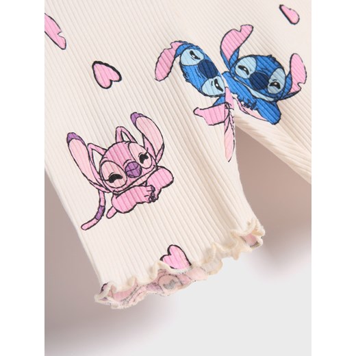 Sinsay - Krótkie legginsy Stitch - kremowy Sinsay 116 Sinsay