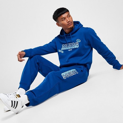 ADIDAS SPODNIE GRADIENT PANT BLU ze sklepu JD Sports  w kategorii Spodnie męskie - zdjęcie 178189841