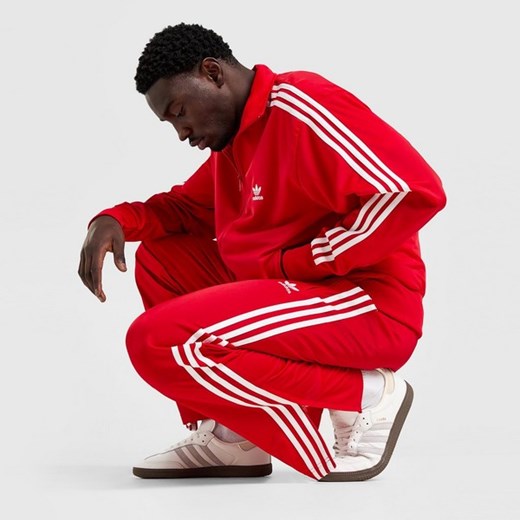 ADIDAS SPODNIE FIREBIRD PNT RED ze sklepu JD Sports  w kategorii Spodnie męskie - zdjęcie 178190043