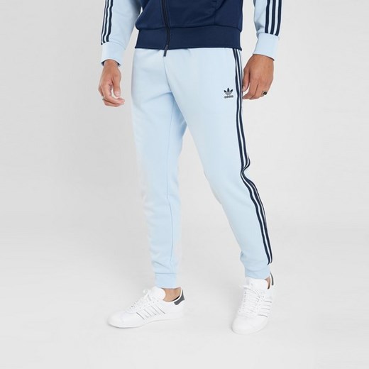 ADIDAS SPODNIE SSTP SEMI BLU/INK&#039; ze sklepu JD Sports  w kategorii Spodnie męskie - zdjęcie 178193033