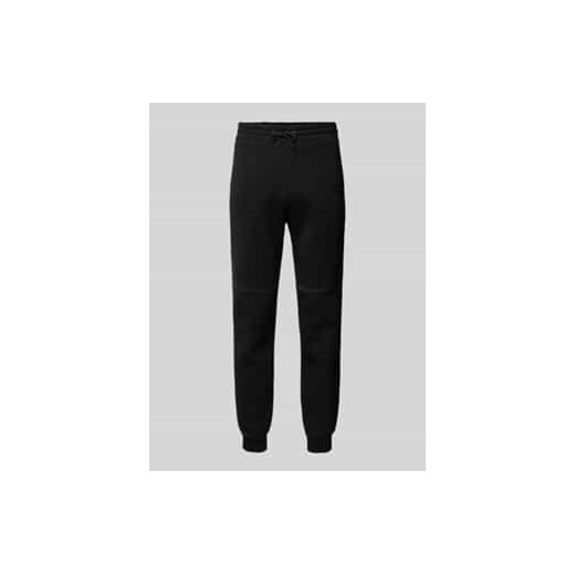Spodnie dresowe o kroju tapered fit z nadrukiem z logo ze sklepu Peek&Cloppenburg  w kategorii Spodnie męskie - zdjęcie 178209022