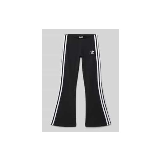 Legginsy o rozkloszowanym kroju z nadrukiem z logo ze sklepu Peek&Cloppenburg  w kategorii Spodnie dziewczęce - zdjęcie 178273721