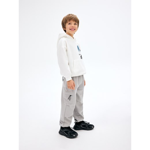 Spodnie chłopięce Reserved białe 