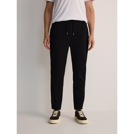 Reserved - Spodnie slim fit z wiązaniem - czarny ze sklepu Reserved w kategorii Spodnie męskie - zdjęcie 178281172
