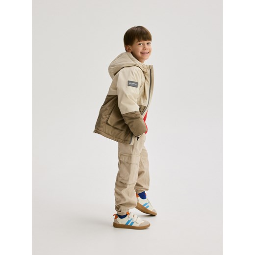 Reserved - Spodnie cargo - beżowy Reserved 122 (6-7 lat) Reserved
