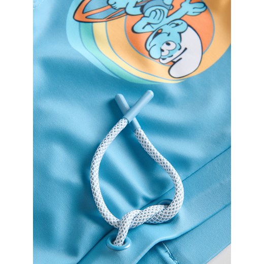 Reserved - Szorty kąpielowe Smerfy - jasnoniebieski Reserved 98/104 (2-4 lata) Reserved