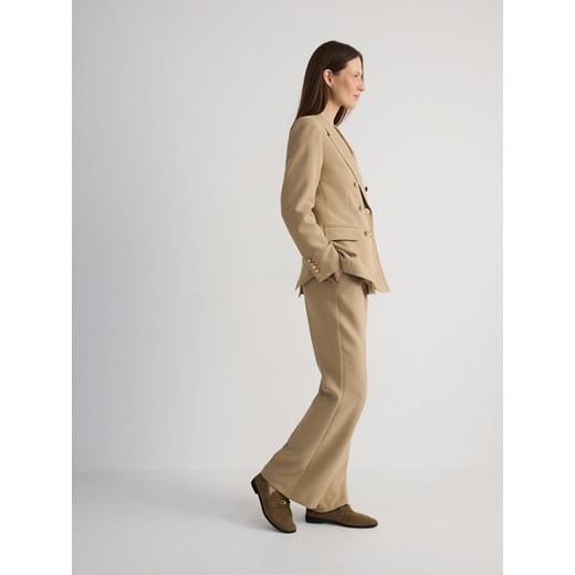 Reserved - Spodnie flare z kantem - beżowy Reserved XS Reserved