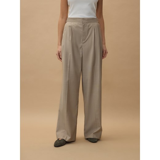 Spodnie damskie beżowe Reserved z tkaniny 