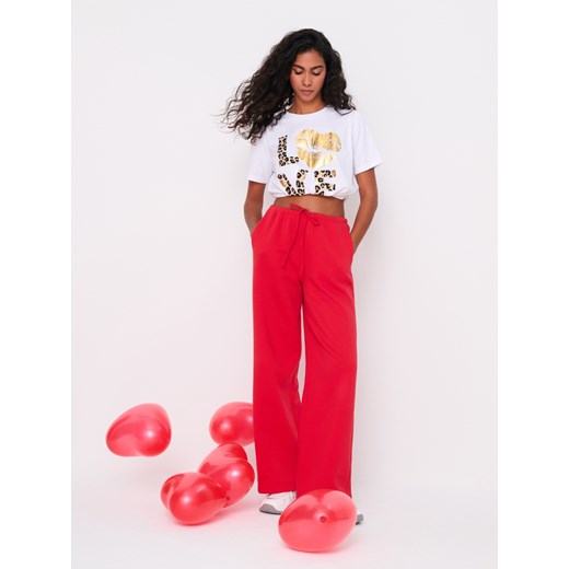 Bluzka damska Sinsay z krótkim rękawem z bawełny w nadruki 