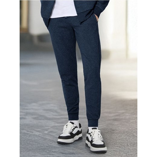 Sinsay - Spodnie dresowe slim jogger - niebieski ze sklepu Sinsay w kategorii Spodnie męskie - zdjęcie 178371560