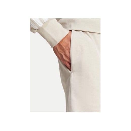adidas Szorty sportowe Essentials Linear JC9346 Beżowy Regular Fit M MODIVO