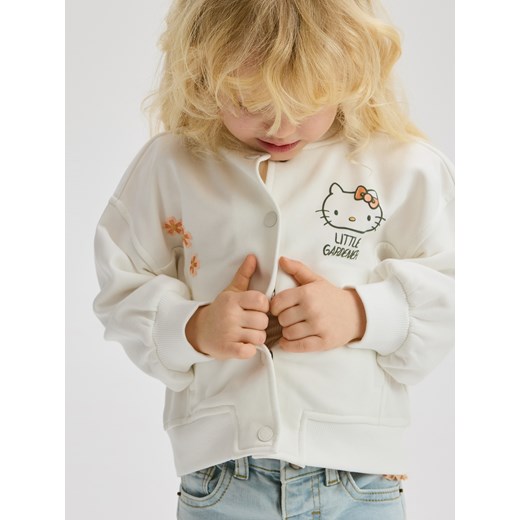 Reserved - Bluza bomberka Hello Kitty - złamana biel ze sklepu Reserved w kategorii Bluzy dziewczęce - zdjęcie 178390243