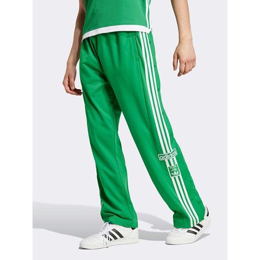 adidas Spodnie dresowe w kolorze zielonym ze sklepu Limango Polska w kategorii Spodnie męskie - zdjęcie 178424231