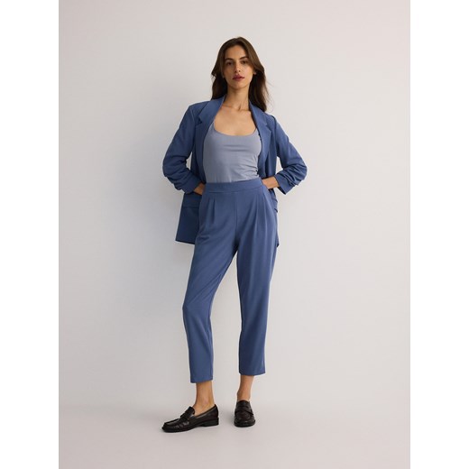 Reserved - Spodnie jogger z zakładkami - jasnoniebieski ze sklepu Reserved w kategorii Spodnie damskie - zdjęcie 178499952