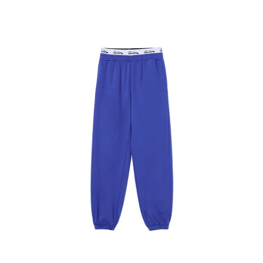 Cropp - Niebieskie dresowe joggery z nadrukiem - granatowy ze sklepu Cropp w kategorii Spodnie damskie - zdjęcie 178514284