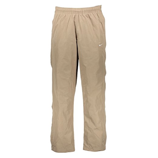 Nike Sportswear Spodnie sportowe &quot;Authentics Tearaway&quot; w kolorze beżowym ze sklepu Limango Polska w kategorii Spodnie męskie - zdjęcie 178536020