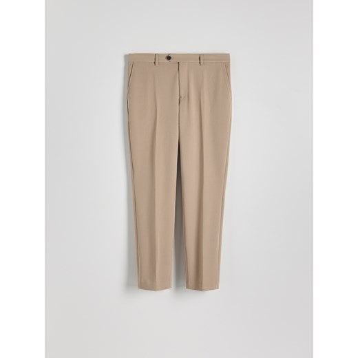 Reserved - Spodnie chino slim z kantem - beżowy Reserved 29 Reserved