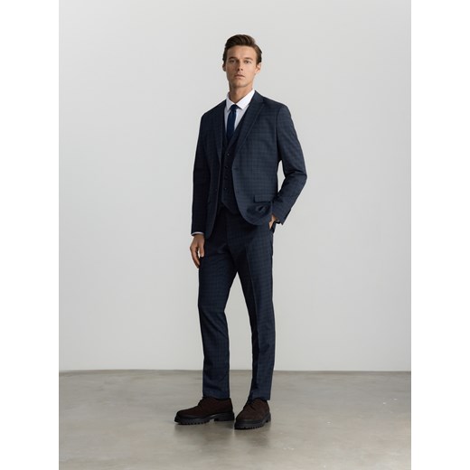 Reserved - Spodnie slim fit z kantem - granatowy ze sklepu Reserved w kategorii Spodnie męskie - zdjęcie 178587894