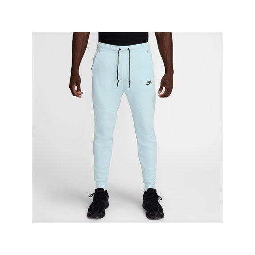 Męskie dzianinowe joggery Nike Tech - Niebieski ze sklepu Nike poland w kategorii Spodnie męskie - zdjęcie 178602774