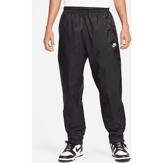 Męskie spodnie z tkaniny z podszewką Nike Windrunner - Czerń Nike XL Nike poland