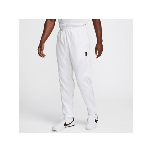 Męskie spodnie do tenisa NikeCourt Heritage - Biel ze sklepu Nike poland w kategorii Spodnie męskie - zdjęcie 178603602
