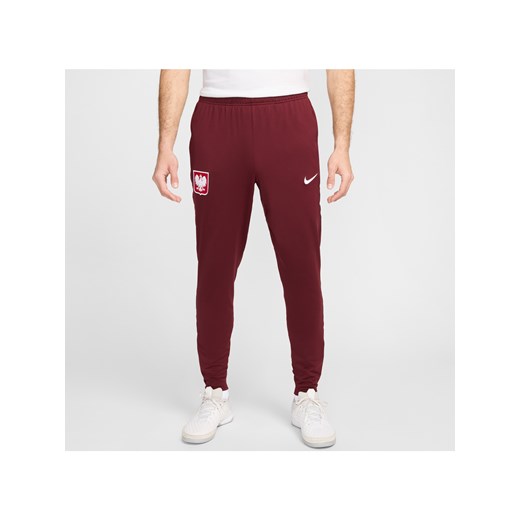 Męskie spodnie piłkarskie Polska Strike Nike Dri-FIT - Czerwony ze sklepu Nike poland w kategorii Spodnie męskie - zdjęcie 178603773