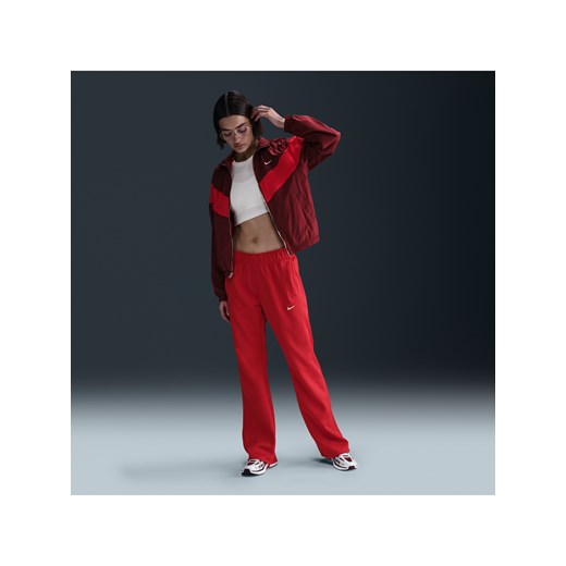 Damskie dopasowane spodnie z dzianiny ze średnim stanem Nike Sportswear Windrunner - Czerwony ze sklepu Nike poland w kategorii Spodnie damskie - zdjęcie 178605360