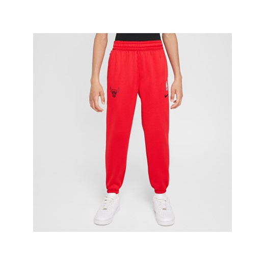 Spodnie dla dużych dzieci Nike Dri-FIT NBA Chicago Bulls Spotlight - Czerwony ze sklepu Nike poland w kategorii Spodnie chłopięce - zdjęcie 178605474