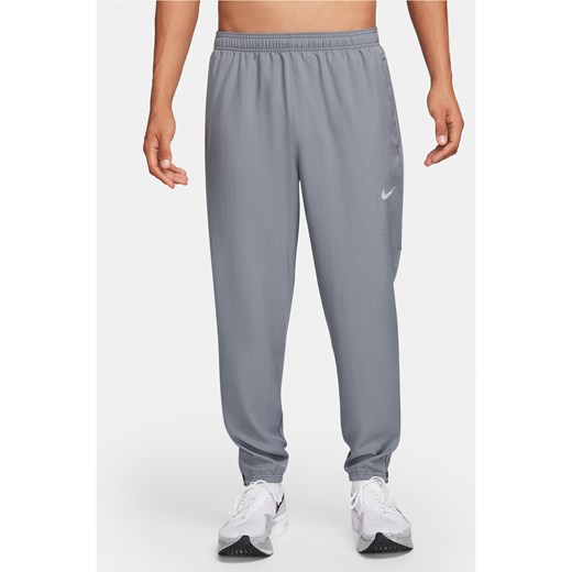 Męskie spodnie do biegania z tkaniny Dri-FIT Nike Challenger - Szary ze sklepu Nike poland w kategorii Spodnie męskie - zdjęcie 178605881