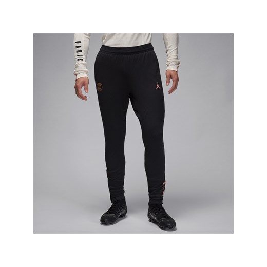 Męskie dzianinowe spodnie piłkarskie Jordan Dri-FIT ADV Paris Saint-Germain Strike Elite (wersja trzecia) - Czerń ze sklepu Nike poland w kategorii Spodnie męskie - zdjęcie 178606100
