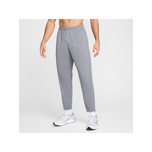 Męskie spodnie do biegania Dri-FIT Nike Challenger - Szary ze sklepu Nike poland w kategorii Spodnie męskie - zdjęcie 178607504