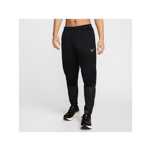 Męskie wodoodporne spodnie do biegania Therma-FIT Nike Sphere Challenger - Czerń ze sklepu Nike poland w kategorii Spodnie męskie - zdjęcie 178608032