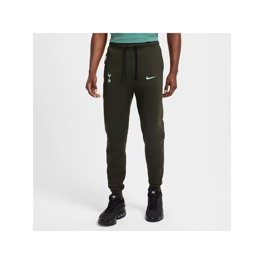 Męskie joggery piłkarskie Nike Tottenham Hotspur Tech Fleece (wersja trzecia) - Zieleń ze sklepu Nike poland w kategorii Spodnie męskie - zdjęcie 178608412