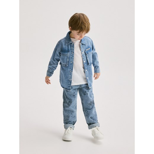 Spodnie chłopięce Reserved z nadrukami 