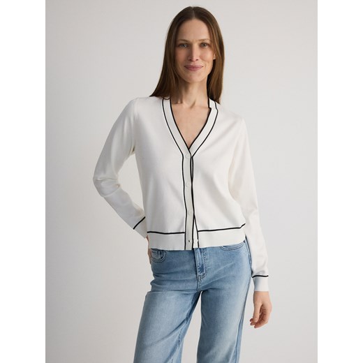 Reserved - Spodnie z dekoracyjną różą - niebieski Reserved 34 Reserved