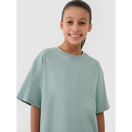 Dziewczęcy t-shirt oversize 4F 4FJWSS25TTSHF1851 - turkusowy ze sklepu Sportstylestory.com w kategorii Bluzki dziewczęce - zdjęcie 178657244