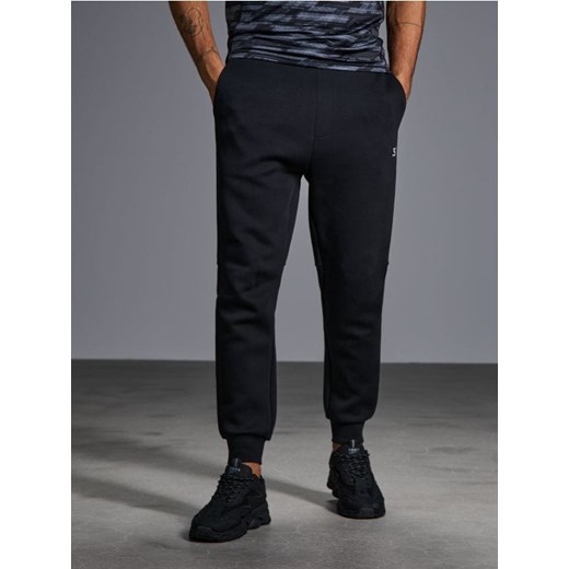 Sinsay - Spodnie tapered fit - czarny Sinsay M Sinsay