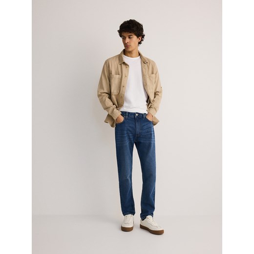 Reserved - Jeansy slim z efektem sprania - niebieski Reserved 33 Reserved